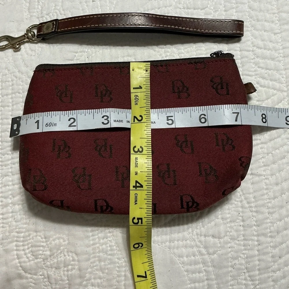 Dooney & Bourke red monogram canvas zip case with a key holder